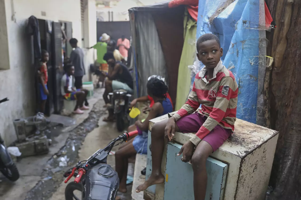 Haitians yearn for home as gangs welcome them and police warn it's too dangerous