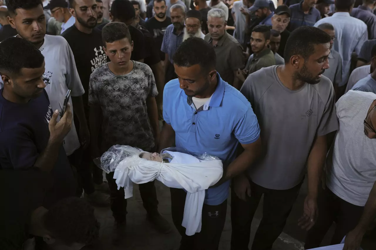 Israel strikes Gaza City high-rise building while ramping up offensive to take over the area