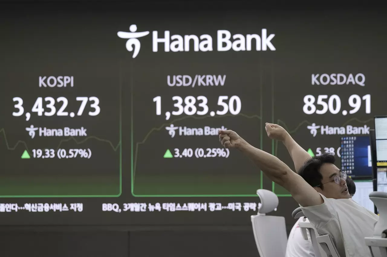 Asian shares mostly climb after US stocks remained near record levels following the Fed's rate cut