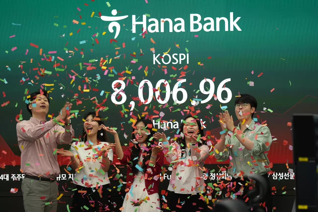 Asian stocks are lower after South Korea's Kospi hits records, as Trump wraps up Beijing trip