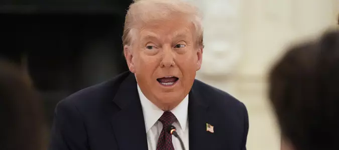 Trump having dinner at a restaurant near the White House to promote his Washington crackdown