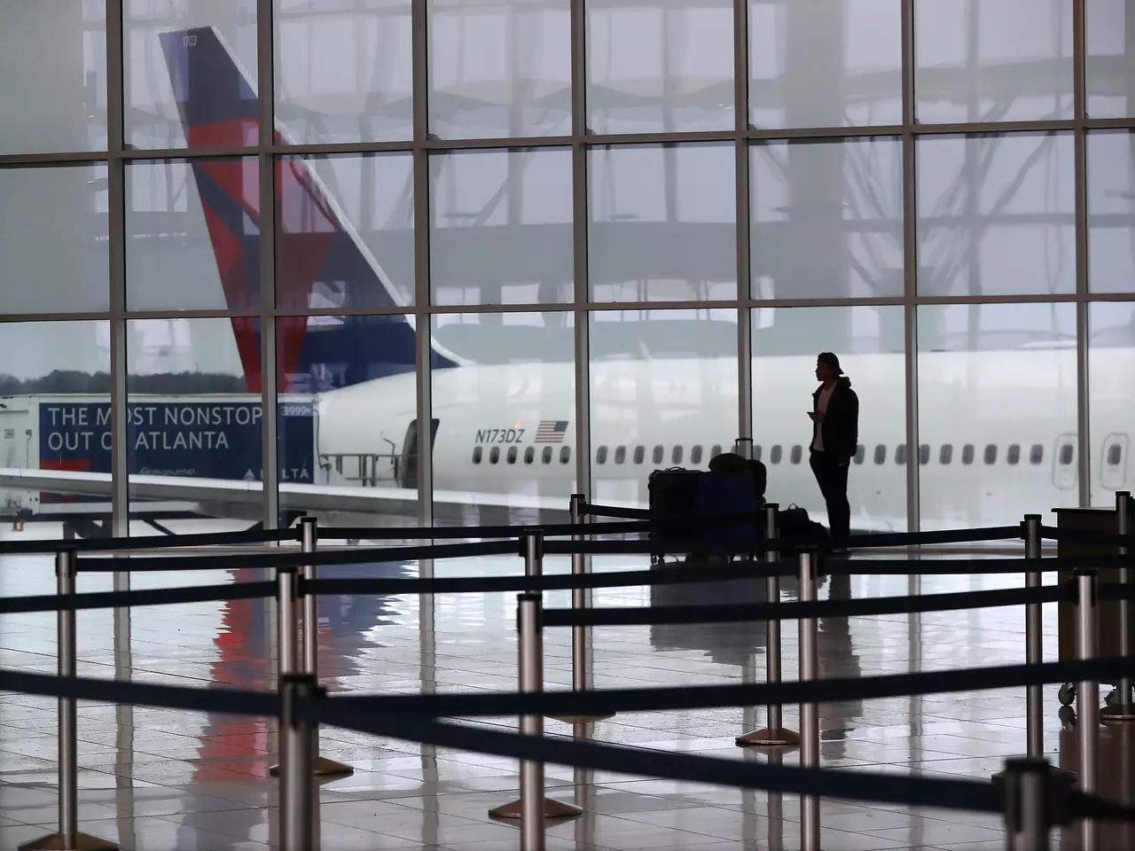 Man with semi-automatic weapon threatened to ‘shoot up’ Atlanta airport, police say