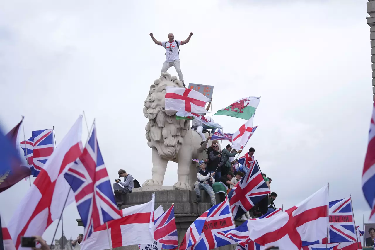 Thousands march in London in support of far-right activist Tommy Robinson