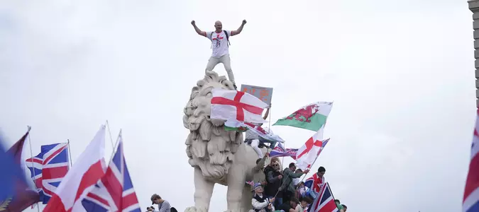 Thousands march in London in support of far-right activist Tommy Robinson