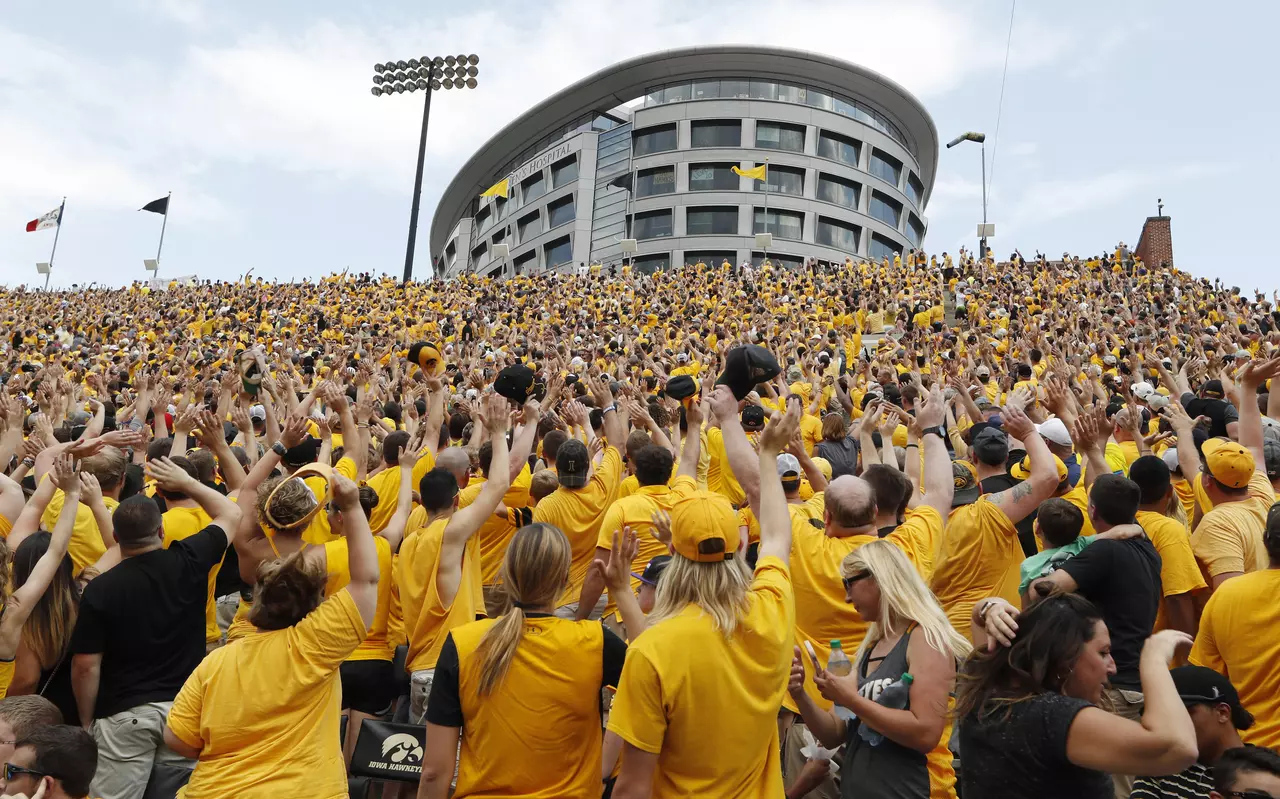 College football traditions: 'Hawkeye Wave' bonds everyone in stadium with kids in adjacent hospital