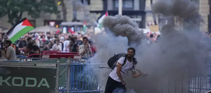 Chaotic scenes in Madrid as pro-Palestinian protesters disrupt final stage of Vuelta cycling race