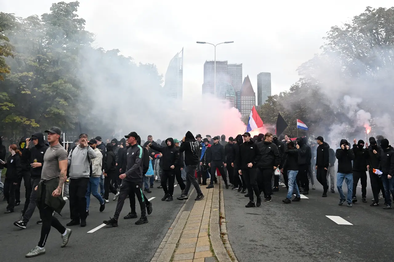 Dutch riot police break up far-right protest in The Hague after violence erupts