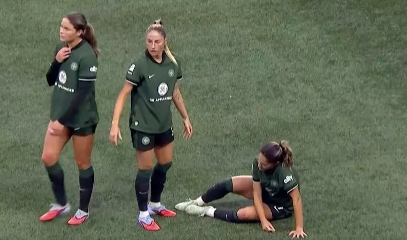 Racing Louisville's DeMelo hospitalized following mid-match collapse