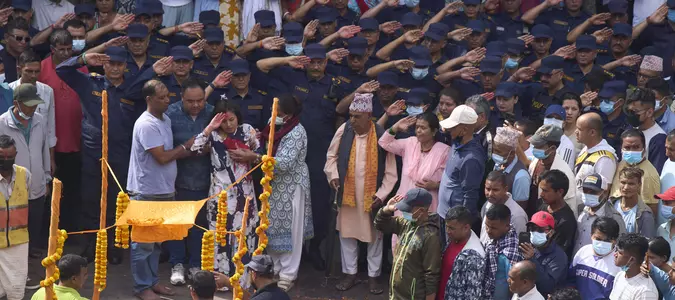 Nepal's president appoints former chief justice as interim premier and first woman leader