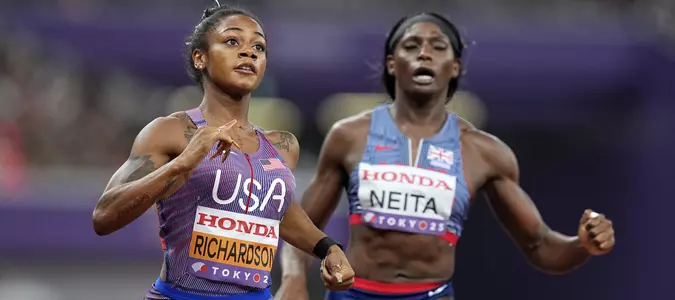 Despite a stumble, Sha'Carri makes the 100-meter final at world championships