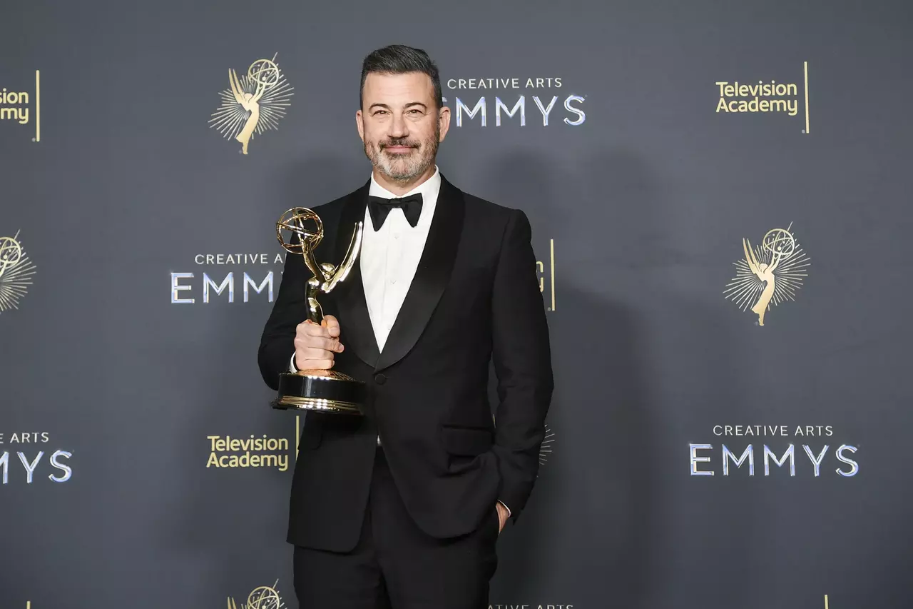 Jimmy Kimmel says he's not defending democracy. But he's standing up for fellow Emmy nominee Colbert
