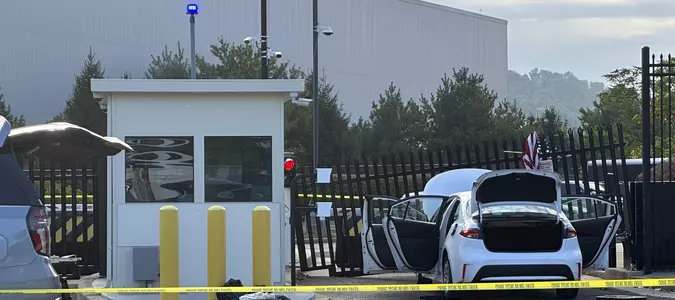 Driver rams car into FBI building gate in Pittsburgh and leaves behind an American flag