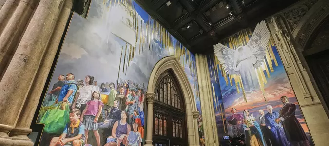 A massive mural honoring NYC immigrants now fills the entrance to St. Patrick’s Cathedral