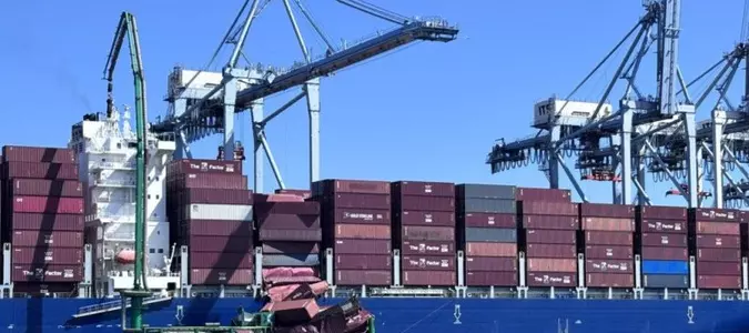Dozens of shipping containers fall from vessel at California port