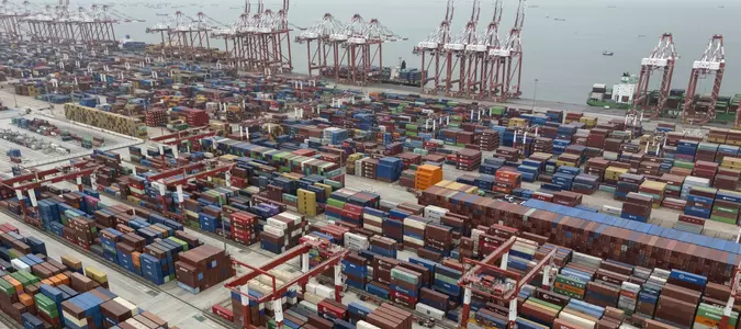 Shipping companies support a first-ever global fee on greenhouse gases, opposed by Trump officials