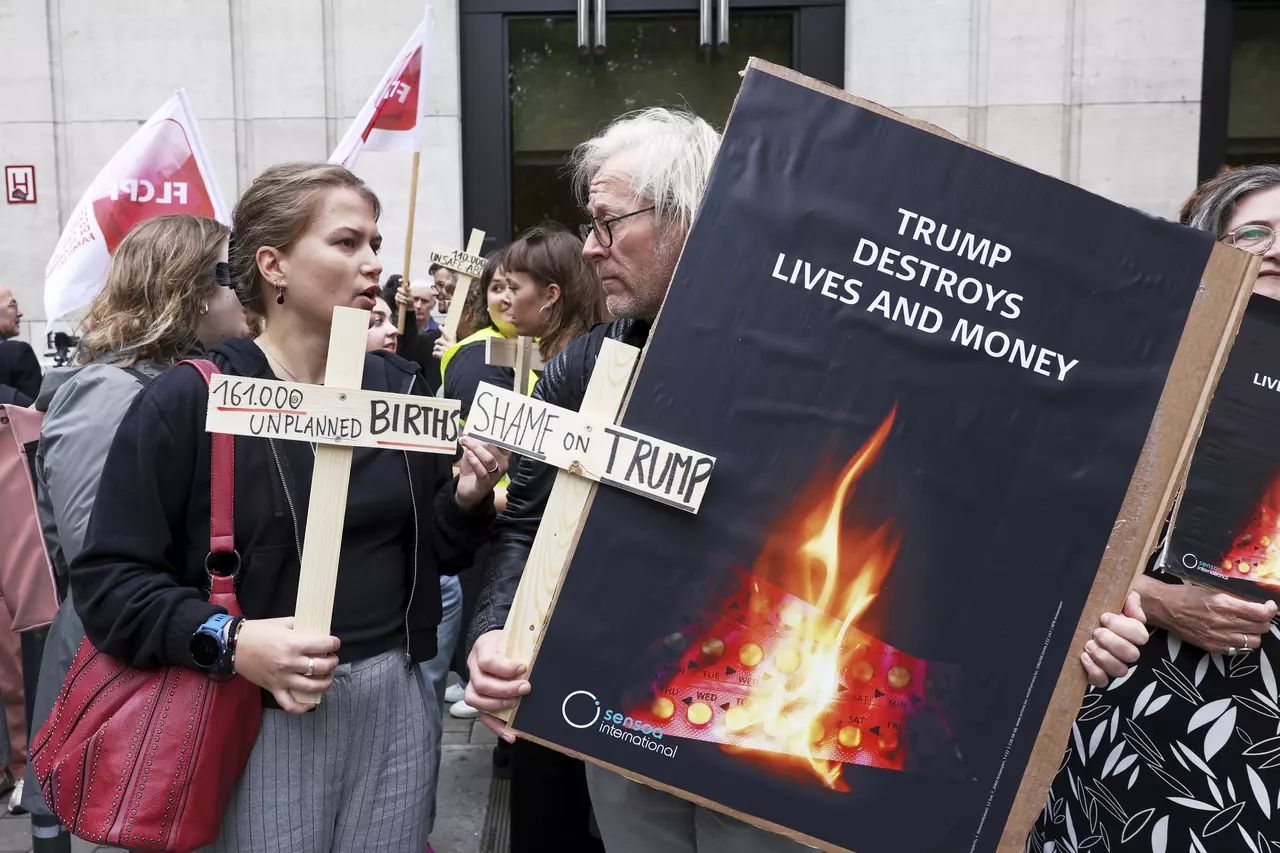 Women's rights activists rally in Belgium fearing US plans for birth control supplies