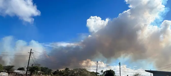 Maui officials sound emergency sirens and evacuate residents as wildfire threatens north shore town