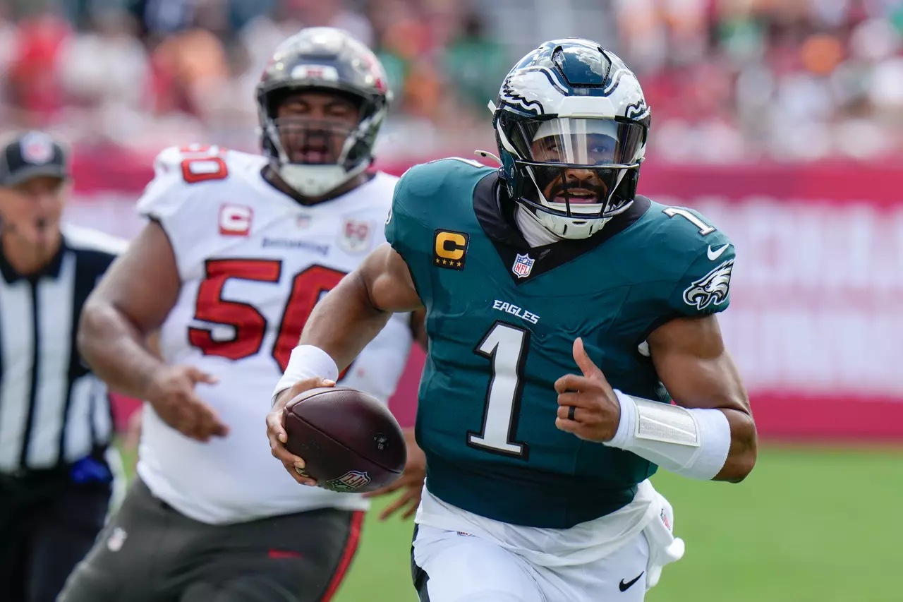 Fake tush push and special teams TD help Eagles beat Bucs 31-25 to stay undefeated
