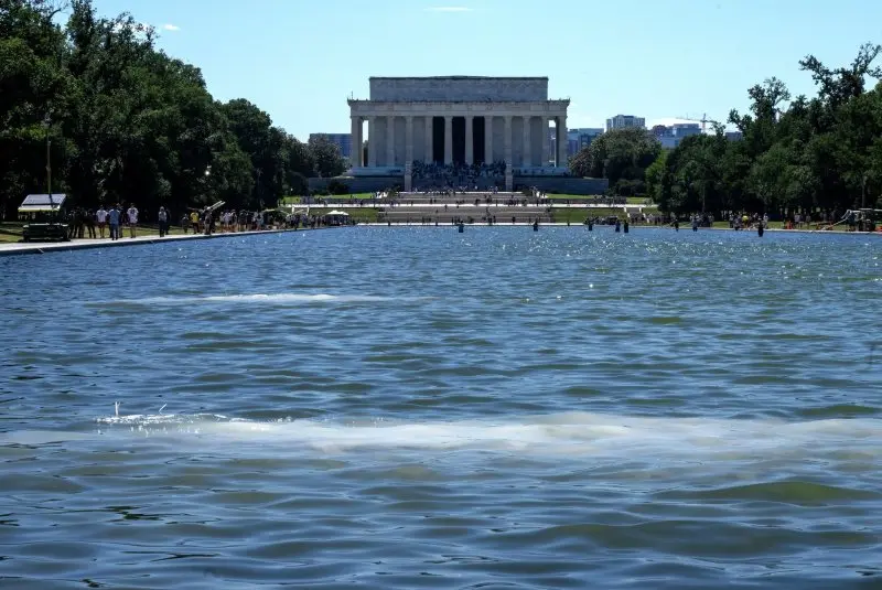 3 more charged for reflecting pool damage; Olympian pleads not guilty