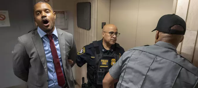 Elected officials and dozens of protesters are arrested at Manhattan immigration holding facility