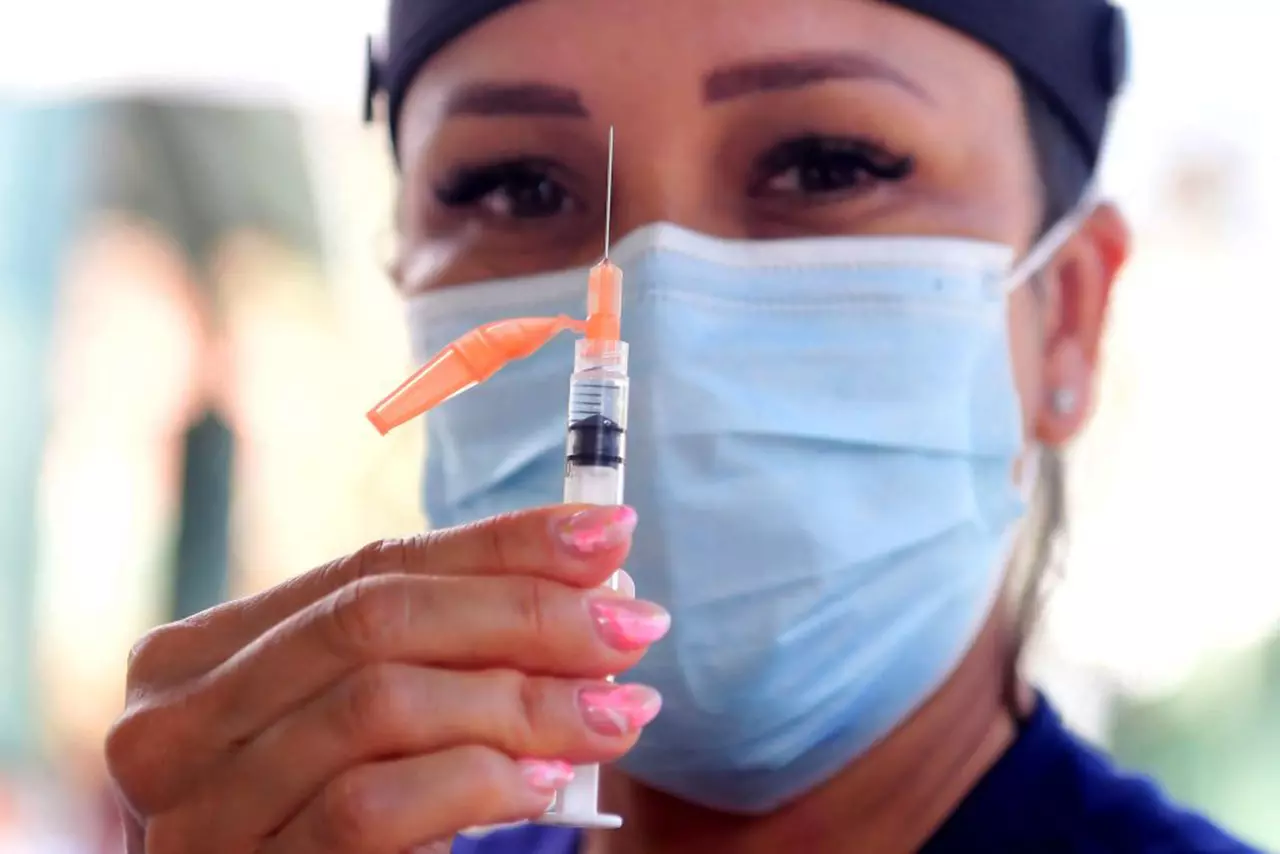 People can't get COVID vaccines as cases surge. Anger is building against Trump