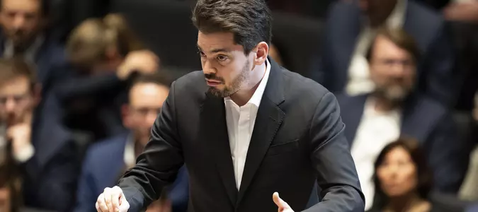 Belgian festival's decision to cancel a concert led by an Israeli conductor draws criticism